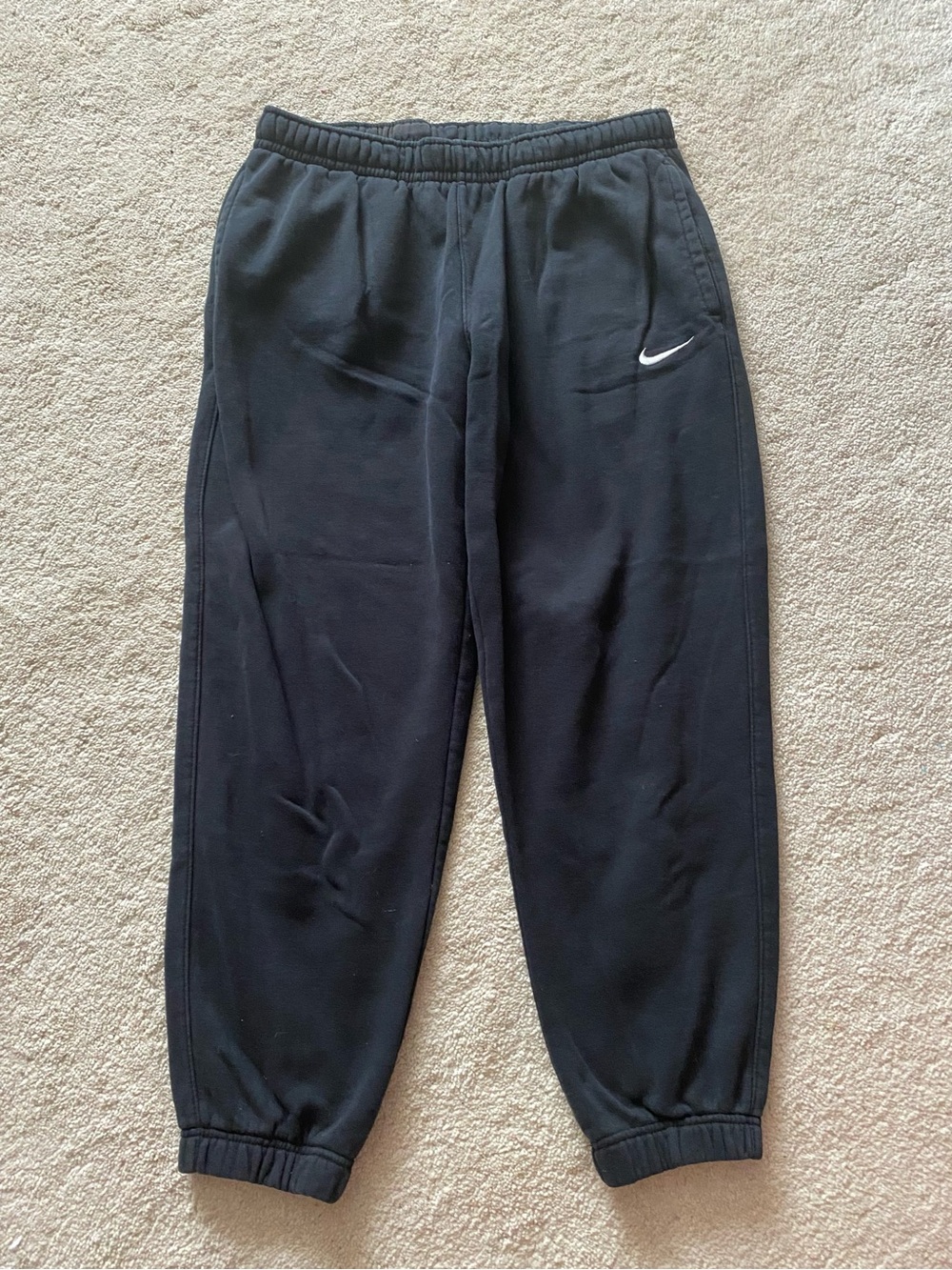 Nike woman’s Black Fleece Jogger Sweatpants with White Swoosh Accent